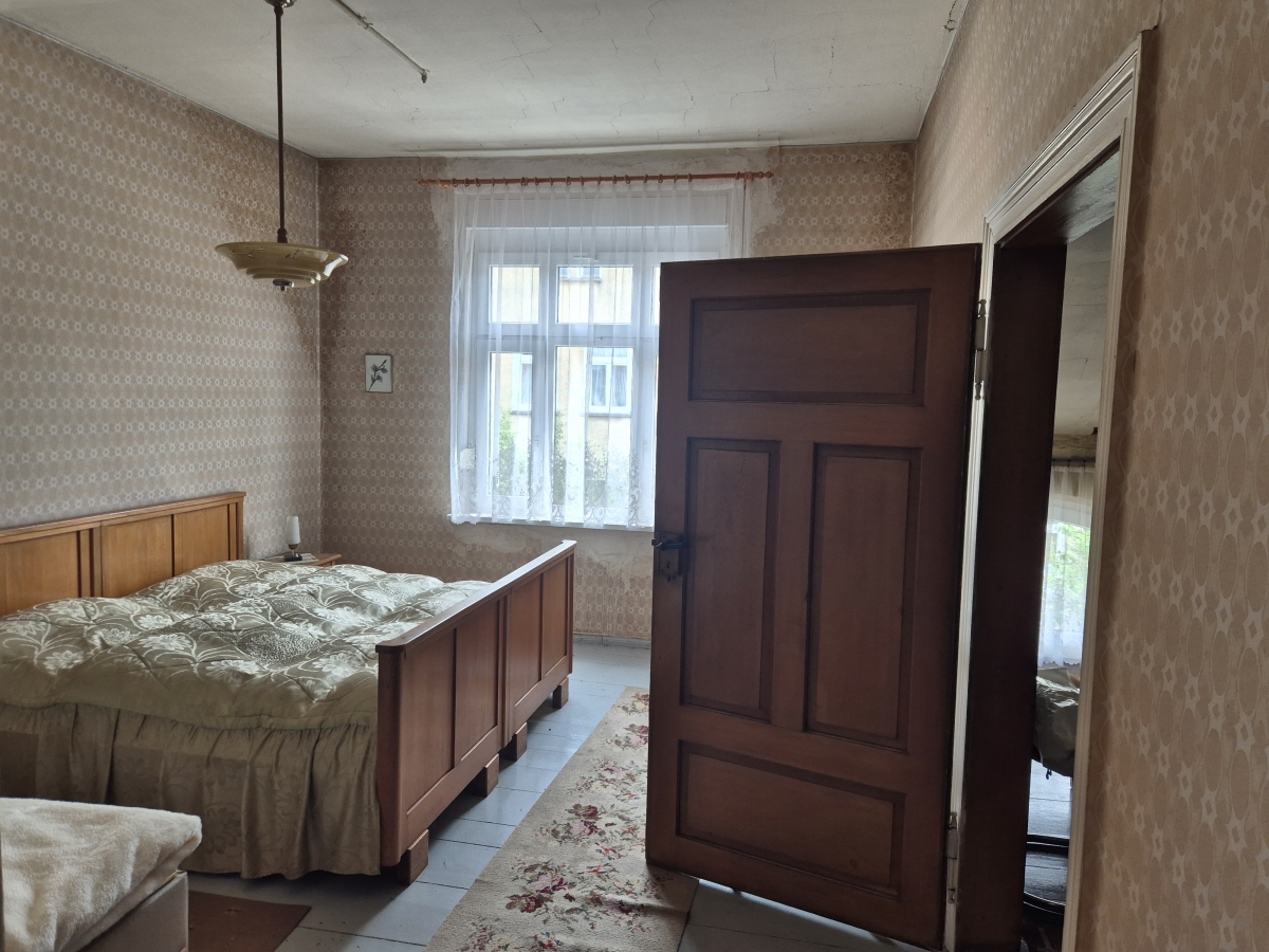 Schlafzimmer_DG_ASKANIA Immobilien GmbH